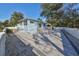 Light blue house exterior with a large backyard patio at 1846 3Rd S St, St Petersburg, FL 33705