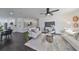 Open concept living area with modern furniture and kitchen view at 1846 3Rd S St, St Petersburg, FL 33705