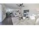 Spacious living room features an open floor plan and a view into the kitchen and dining area at 1846 3Rd S St, St Petersburg, FL 33705