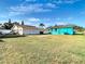 Large backyard with a detached shed and open space at 1900 W Norfolk St, Tampa, FL 33604