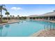 Resort-style pool with plenty of lounge chairs at 2909 Beluga Bay Dr, Odessa, FL 33556