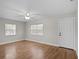 Bright living room with wood-look floors and neutral walls at 37044 Florida Ave, Dade City, FL 33525