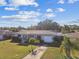 Single-story home with grey roof and landscaped yard at 3862 21St N Ave, St Petersburg, FL 33713