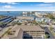 Aerial view showcasing building location and waterfront access at 460 Paula S Dr # 101, Dunedin, FL 34698
