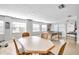 Community room with tables, chairs, and ping pong table at 460 Paula S Dr # 101, Dunedin, FL 34698