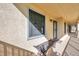 Inviting hallway with a bench and access to condo unit at 460 Paula S Dr # 101, Dunedin, FL 34698