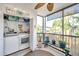Convenient laundry room with washer and dryer, and extra storage at 460 Paula S Dr # 101, Dunedin, FL 34698