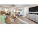 Relaxing living room with sectional sofa and wood floors at 460 Paula S Dr # 101, Dunedin, FL 34698