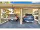 Covered parking spot available under building with easy access at 460 Paula S Dr # 101, Dunedin, FL 34698