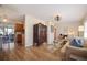 Light and airy living room featuring hardwood floors, a beige sofa, and large windows at 5301 16Th N Ave, St Petersburg, FL 33710