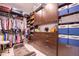 Organized walk-in closet with custom shelving, drawers, and ample storage space at 5951 Bay Dr, Gulfport, FL 33707