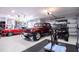 Spacious three car garage with organized storage, epoxy flooring, and room for a home gym at 5951 Bay Dr, Gulfport, FL 33707