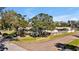 House on a tree-lined street in a residential neighborhood at 7801 17Th N Way, St Petersburg, FL 33702