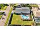 Aerial view of house and backyard with pool and shed at 7801 17Th N Way, St Petersburg, FL 33702