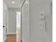 Hallway showing updated interior, modern fixtures, wood-look floors and fresh paint at 7801 17Th N Way, St Petersburg, FL 33702