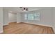 Bright open living room, with hardwood flooring and natural light from the large windows at 7801 17Th N Way, St Petersburg, FL 33702