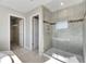 Bathroom with walk-in shower and tile floors at 1192 Multiflora Loop, Lutz, FL 33558