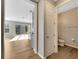 Small bathroom with toilet and hardwood floor at 1192 Multiflora Loop, Lutz, FL 33558