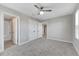 Spacious bedroom with carpet flooring and a double door closet at 1192 Multiflora Loop, Lutz, FL 33558