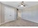 Bedroom with carpet flooring and a double door closet at 1192 Multiflora Loop, Lutz, FL 33558
