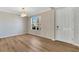 Spacious dining room with hardwood floors and large window at 1192 Multiflora Loop, Lutz, FL 33558