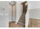 Modern staircase with wood-look laminate at 1192 Multiflora Loop, Lutz, FL 33558