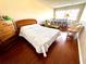 Bedroom with double bed and hardwood floors at 1235 S Highland Ave # 2-308, Clearwater, FL 33756