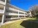 Two-story condo building with landscaped grounds and a spacious layout at 1235 S Highland Ave # 2-308, Clearwater, FL 33756
