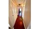 Hallway with hardwood floors and access to bedrooms at 1235 S Highland Ave # 2-308, Clearwater, FL 33756