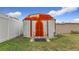 Rustic metal storage shed with a ramp for easy access at 1514 Sadlon Ave, Clearwater, FL 33756