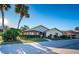 Home's exterior showcasing landscaping and driveway at 2268 Lake Arbor Blvd, Clearwater, FL 33763