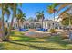 Luxury home with expansive patio, pool, and lush landscaping at 259 6Th N Ave, Tierra Verde, FL 33715