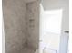 Unfinished bathroom with tiled shower and neutral color scheme at 3430 Sarto Ln, Rotonda West, FL 33947