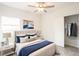 Bright bedroom with a queen-size bed and large closet at 3430 Sarto Ln, Rotonda West, FL 33947
