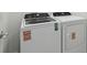Efficient laundry area featuring a modern washing machine and dryer for convenient home care at 3952 Big Sky Dr, Spring Hill, FL 34604