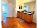 Bright bathroom with double sinks and wood cabinets at 4027 Harbor Lake Dr, Lutz, FL 33558