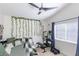 Serene bedroom featuring a daybed, exercise equipment and window at 4324 Auston Way, Palm Harbor, FL 34685