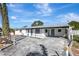 Newly renovated home with carport and landscaped yard at 4633 54Th N Ave, St Petersburg, FL 33714