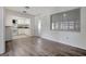 Bright living room with wood-look floors and open concept at 4633 54Th N Ave, St Petersburg, FL 33714