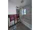 Bathroom with new bathtub and tiled walls, currently under renovation at 6751 Park S St, South Pasadena, FL 33707