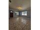 Bright living room with neutral walls and tile flooring at 7304 36Th N Ave, St Petersburg, FL 33710