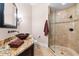 Bathroom with walk-in shower and granite vanity at 8376 Catamaran Cir, Lakewood Ranch, FL 34202