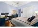 Spacious bedroom with a desk and double bed, offering functionality and comfort at 8376 Catamaran Cir, Lakewood Ranch, FL 34202