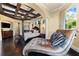 Main bedroom with chaise lounge and access to the pool area at 8376 Catamaran Cir, Lakewood Ranch, FL 34202