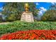 The Lake Club entrance with landscaping at 8376 Catamaran Cir, Lakewood Ranch, FL 34202
