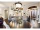 Kitchen and dining area with hardwood floors and white cabinetry at 8376 Catamaran Cir, Lakewood Ranch, FL 34202
