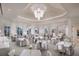 Elegant dining room with multiple tables perfect for events at 8376 Catamaran Cir, Lakewood Ranch, FL 34202