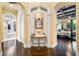 Elegant hallway with marble flooring and access to bedroom and bath at 8376 Catamaran Cir, Lakewood Ranch, FL 34202