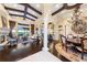 Open living space featuring hardwood floors, a fireplace, and water views at 8376 Catamaran Cir, Lakewood Ranch, FL 34202