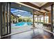 Luxurious pool and spa area with outdoor seating, perfect for relaxation at 8376 Catamaran Cir, Lakewood Ranch, FL 34202